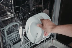 Why Does My Dishwasher Leave White Film on the Dishes?